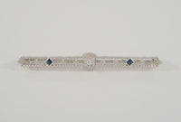 Vintage or Antique Art Deco Solid 14K White Gold Filigree Bar Brooch set w/ a Mine Cut Diamond & Two Blue Sapphires Openwork Pin