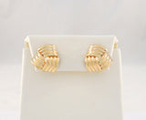 Large Signed Vintage 14K Solid Yellow Gold Fluted Dimensional Swirl or Knot Repousse Modern Pierced Earrings