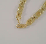 Signed Vintage T&C Solid 10K Yellow Gold 6.35mm Wide Brushed Satin & Polished X & O Link Hugs & Kisses Bracelet 7.25"