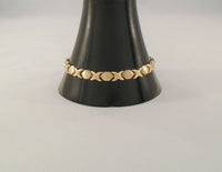 Signed Vintage T&C Solid 10K Yellow Gold 6.35mm Wide Brushed Satin & Polished X & O Link Hugs & Kisses Bracelet 7.25"