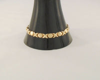 Signed Vintage T&C Solid 10K Yellow Gold 6.35mm Wide Brushed Satin & Polished X & O Link Hugs & Kisses Bracelet 7.25"