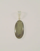 Large Heavily Crafted Signed Vintage Charles Albert Fine Sterling Silver Oval Pendant set w/ a Unique Olive Green Chatoyant Cabochon Stone