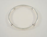 Handcrafted Vintage Sterling Silver Round 6.35mm Bangle Bracelet w/ Applied Wrapped Spiral Ring Details  7.75"