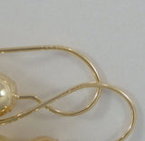 Sleek and Curvy, Signed Vintage Jacmel 14K Solid Yellow Gold Graduated Double Bubble or Stacked Ball Locking Wire Hook Earrings